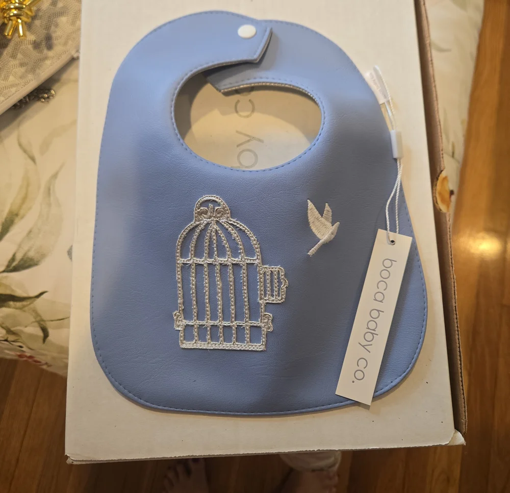 Blue Baby Leather Bib with Bird & Cage Embroidery. Boca Baby Gift Pouch